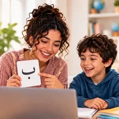 A tutor teaching a child with an Arabic letter flashcard